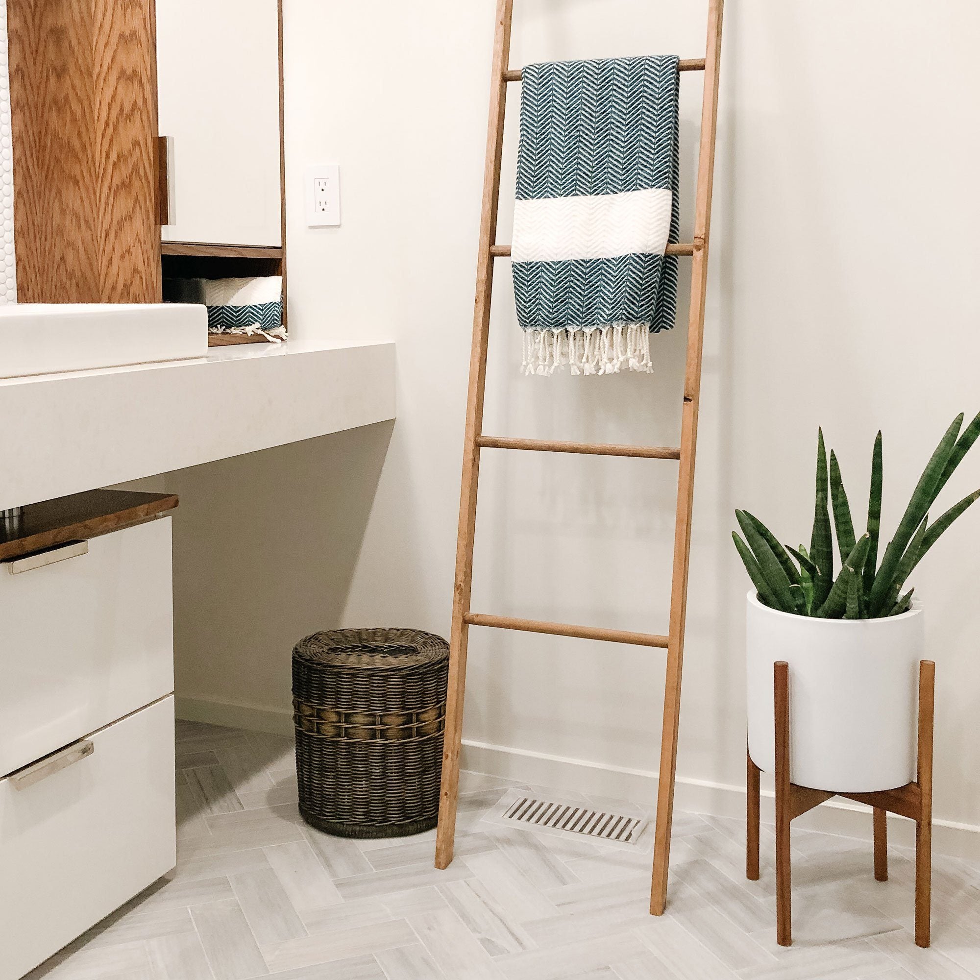 Drop-In Oval Waste Basket in Antique Walnut Brown in bathroom