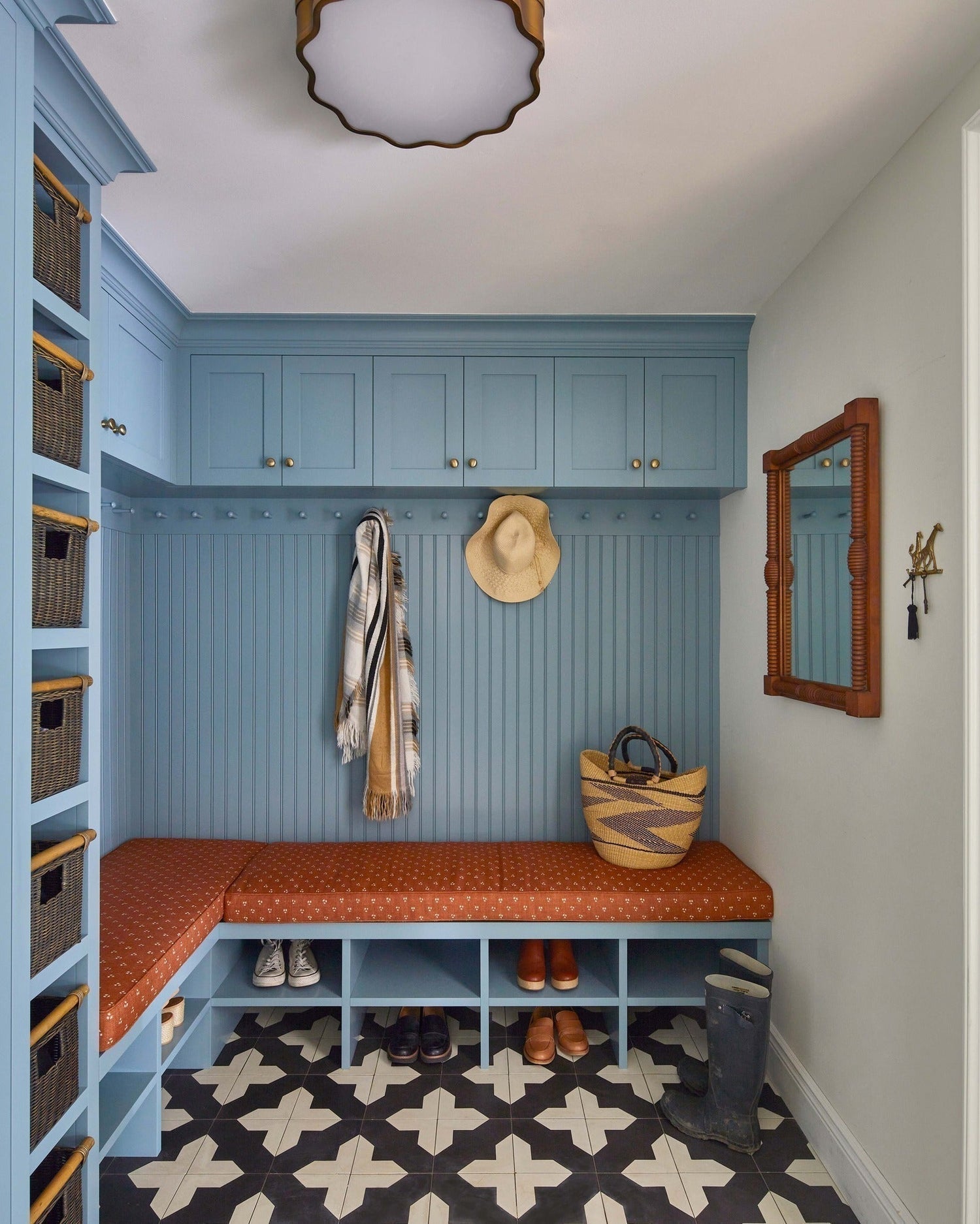 Handwoven wicker cube storage baskets fitted into shelf cubbies for organized home storage