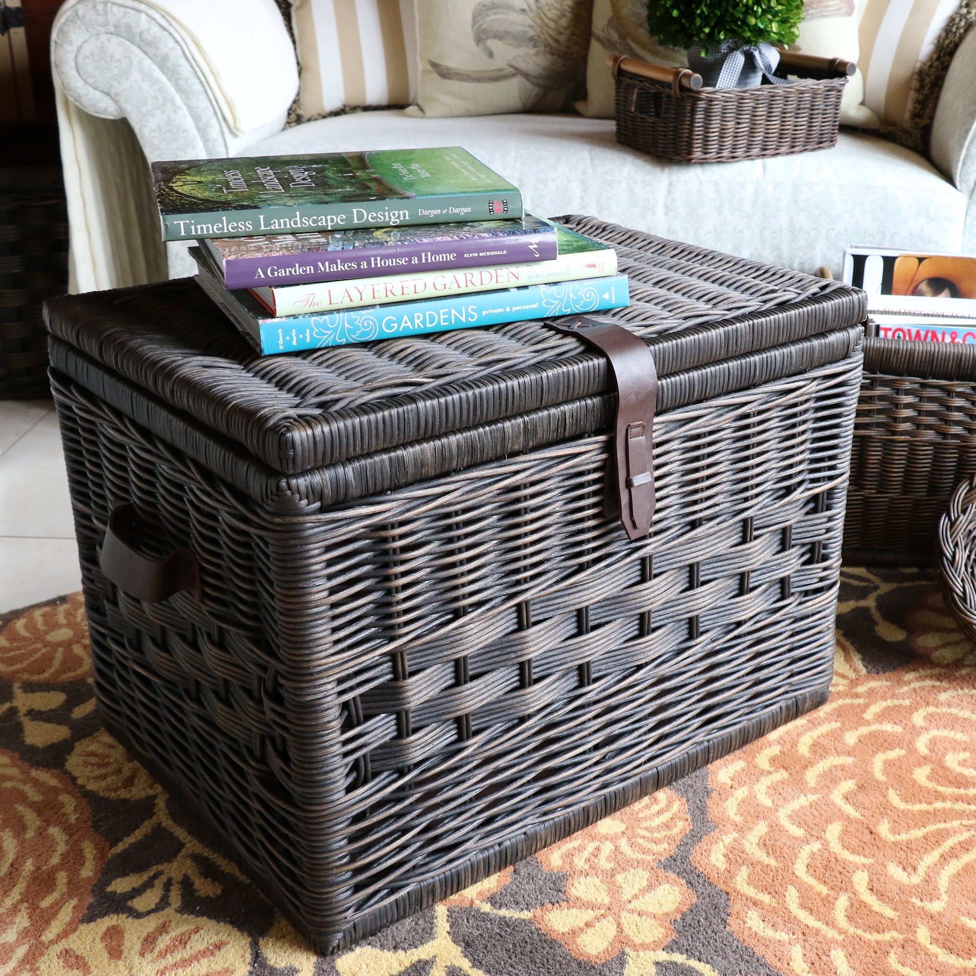 Deep Wicker Storage Trunk in Antique Walnut Brown as living room coffee table