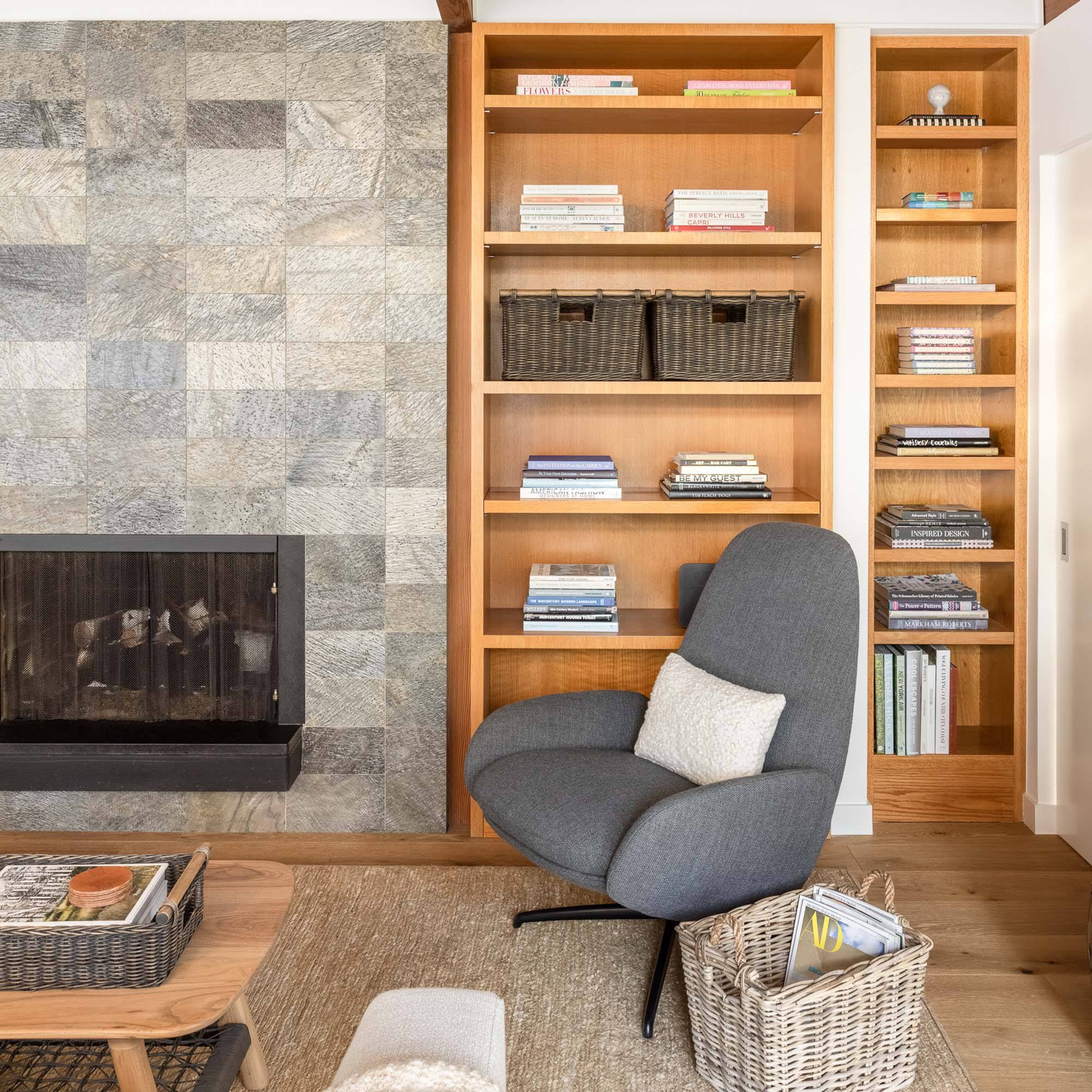 Tall Narrow Wicker Storage Baskets in Antique Walnut Brown as shelf storage in den | The Basket Lady