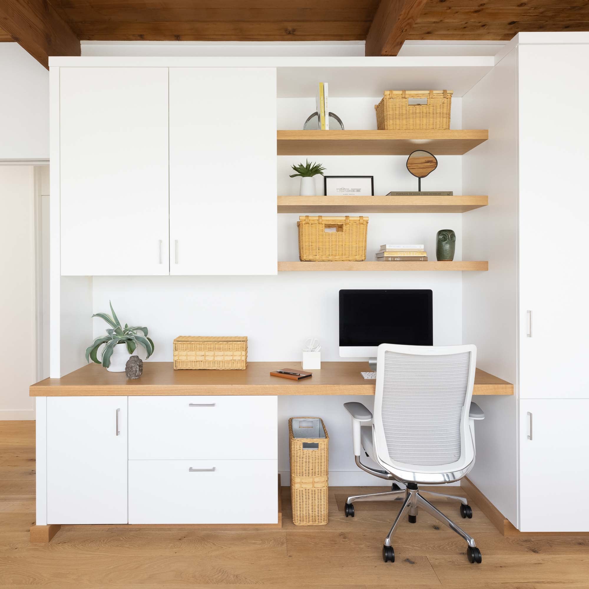 Tall Narrow Wicker Storage Baskets in Sandstone as shelf storage in office | The Basket Lady